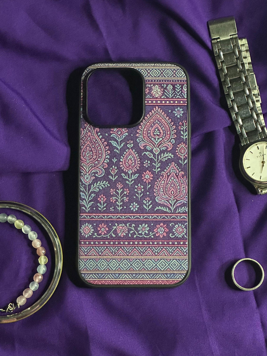 Paisley Sash Case styled on purple fabric